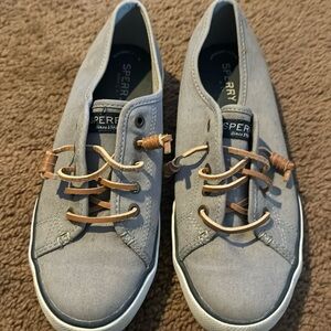 Sperry lace up deck shoe.